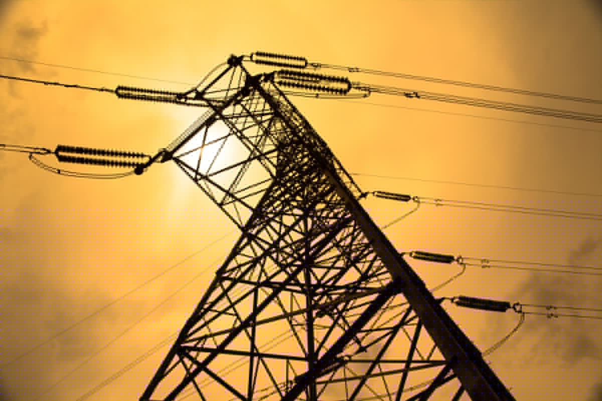 High-voltage transmission tower used by TechCrunch in its AI data center report