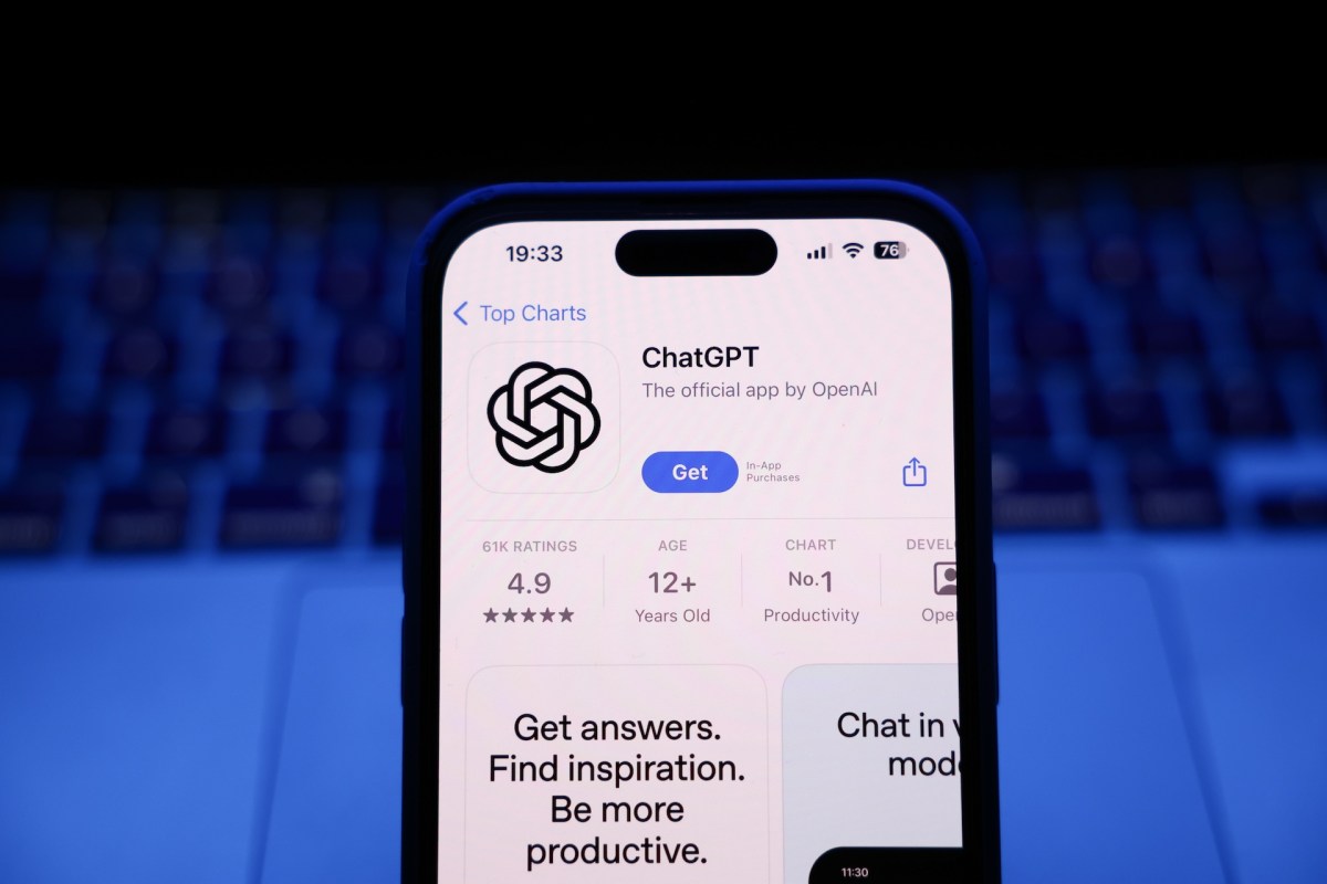 ChatGPT displayed on a phone in the report about free-user text chats