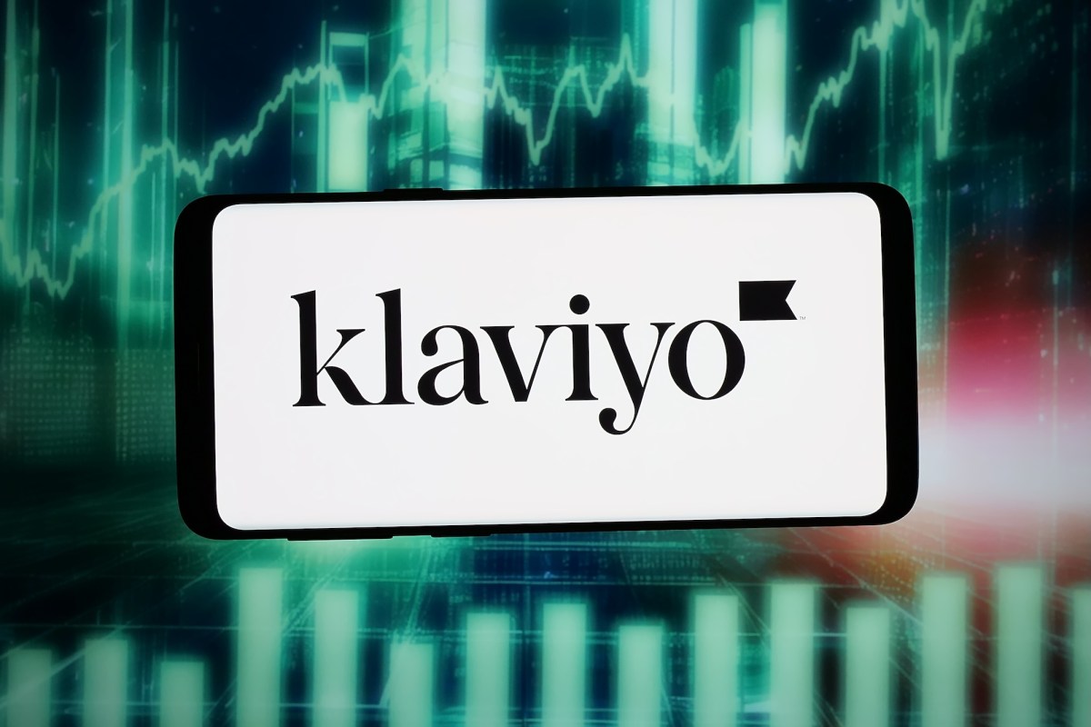 Klaviyo logo on a smartphone in the TechCrunch report on signup tracking