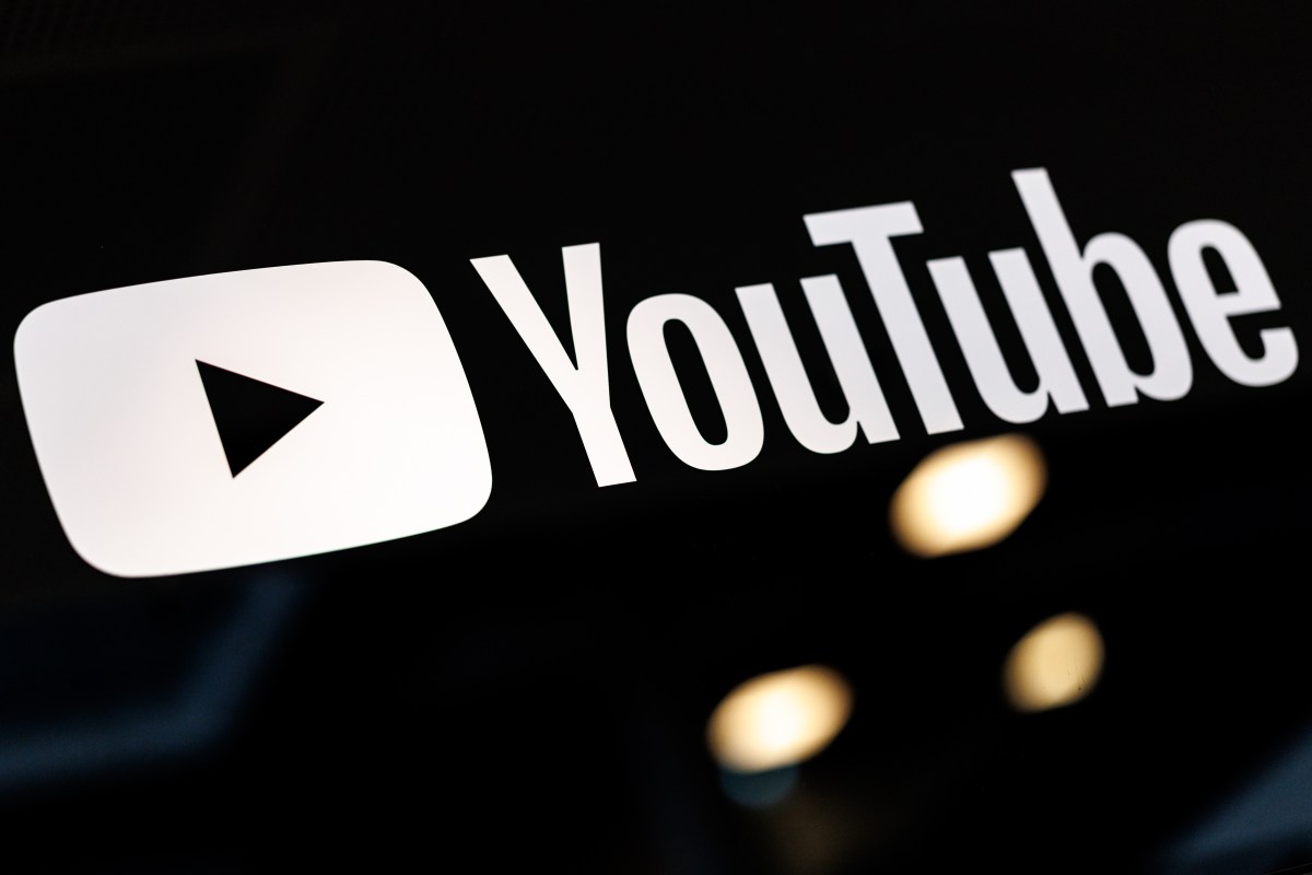 YouTube logo at a Google event in the report on monetization eligibility changes