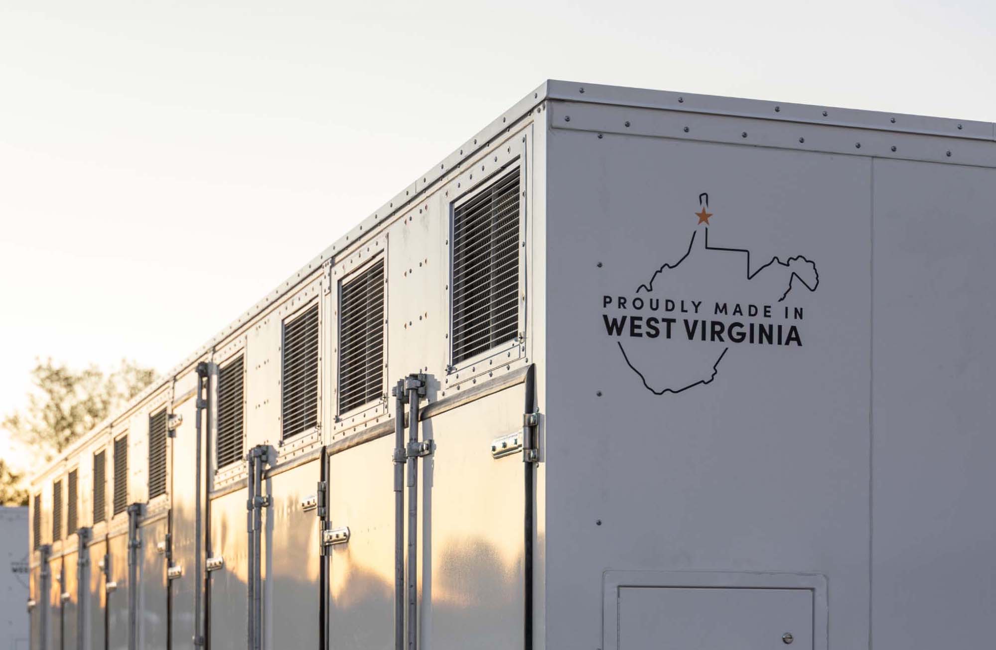 A Form Energy grid-scale battery installation under a clear sky