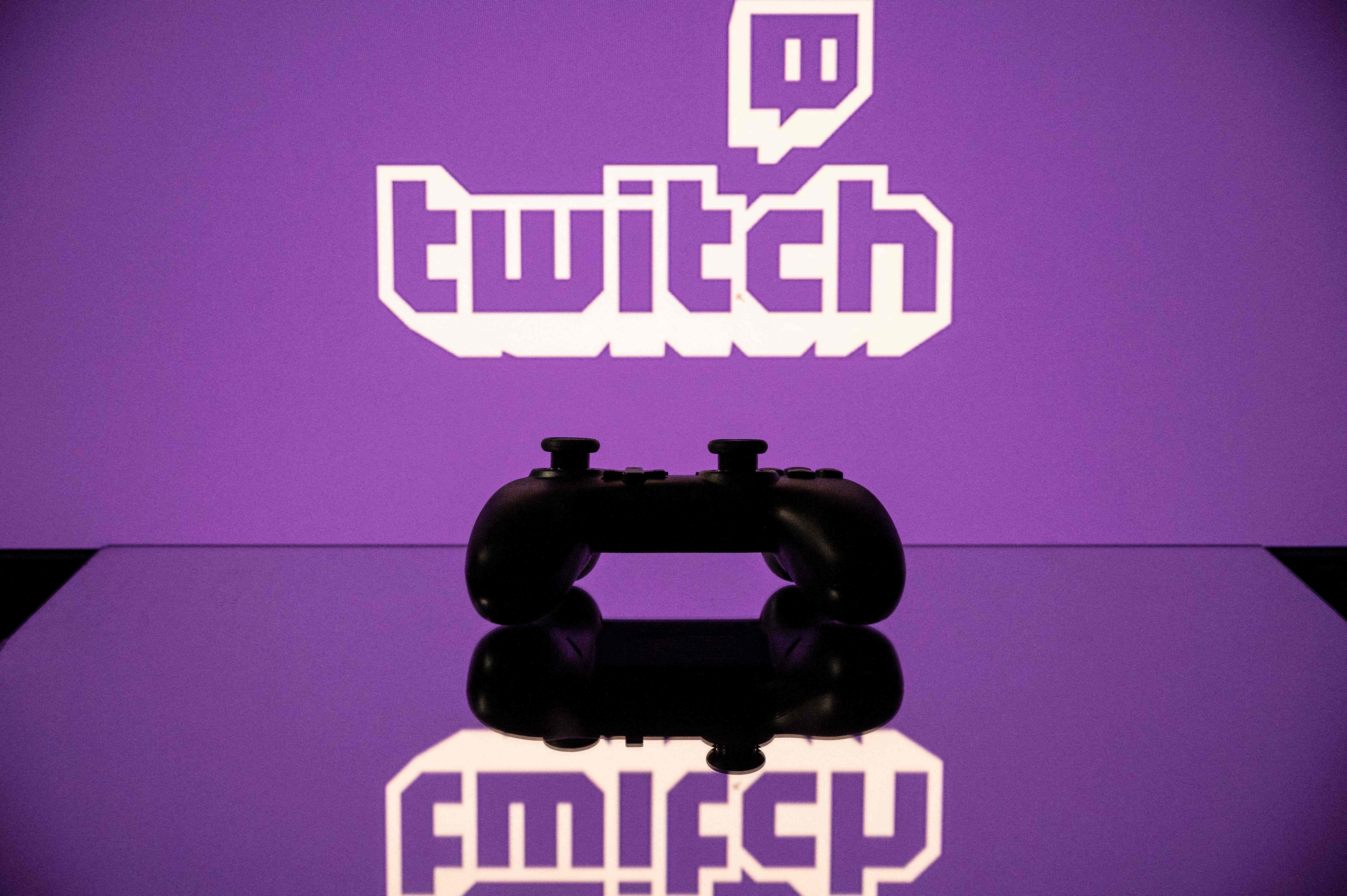 Twitch logo reflected beside a game controller