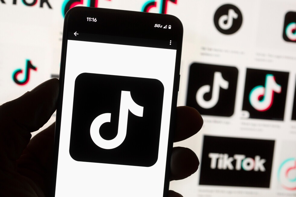 TikTok application logo displayed on a smartphone