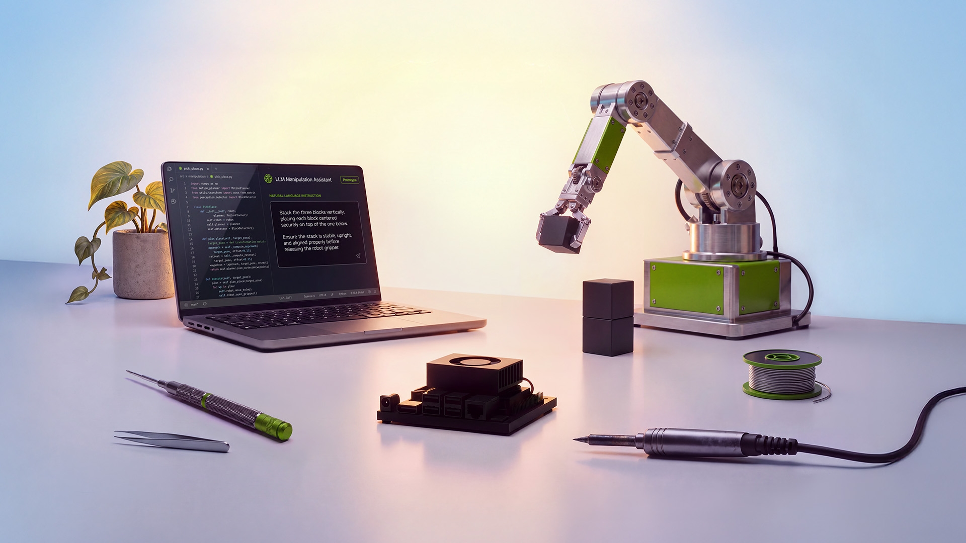 NVIDIA Jetson Orin Nano 2 developer system beside a laptop and small robotic arm