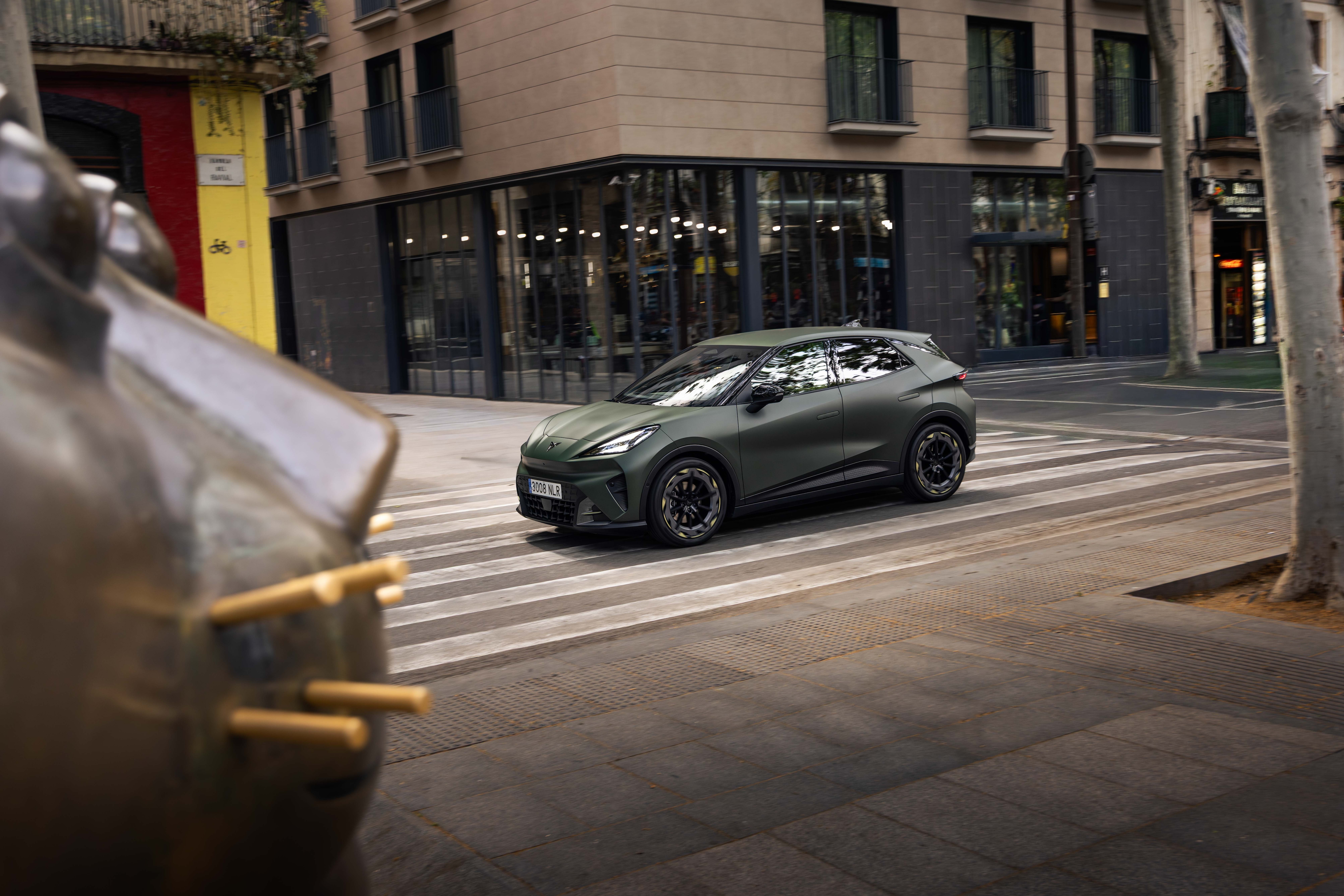 CUPRA Raval driving on a city street in an official product photograph