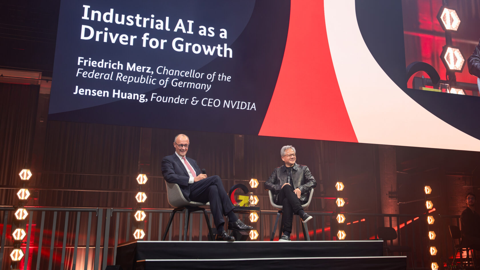 Official NVIDIA photograph of Friedrich Merz and Jensen Huang seated at the Invest in Germany Summit in Berlin